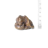 A wood netsuke of a tiger and cub By Kokei, Kuwana, Ise Province, late 18th/early 19th century