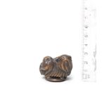 A boxwood netsuke of a Chin dog By Tametaka, Nagoya, late 18th century/early 19th century