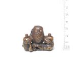 A wood netsuke of an owl and young By Kano Tomokazu, Gifu, circa 1840