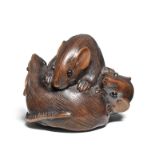 A wood netsuke of three rats By Kazutomo, Gifu, 19th century