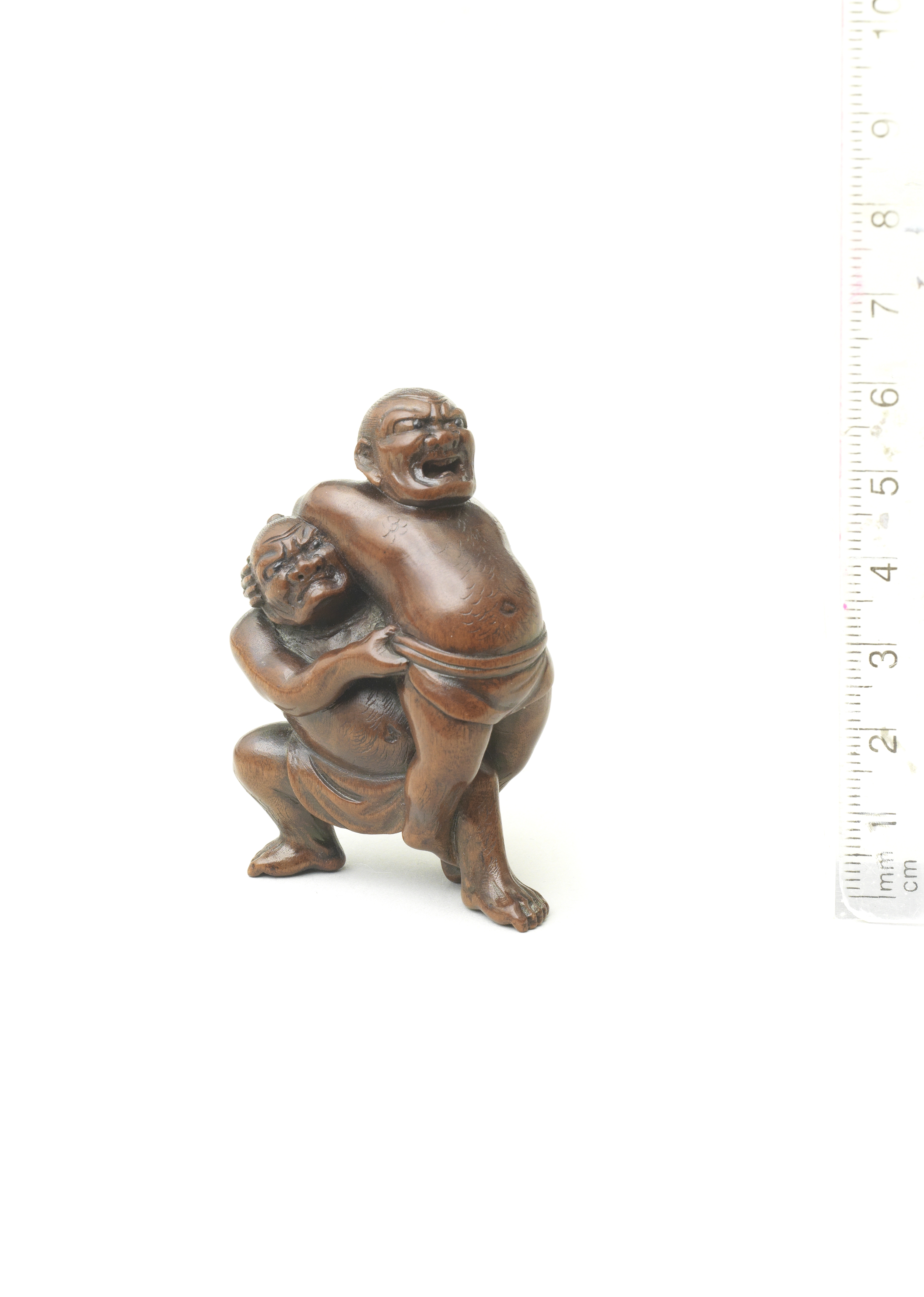 A wood netsuke of Kawazu Sukeyasu and Matano Kagehisa By Masakazu, Gifu, late 19th century