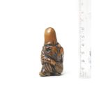 A wood netsuke of Fukurokuju By Tsuji, late 18th century