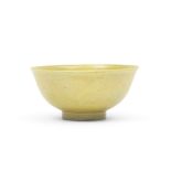 A yellow-glazed 'dragon' bowl Kangxi six-character mark and of the period (2)