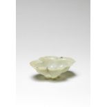 A rare pale green jade quatrelobed 'lotus' shaped brush washer 17th century (2)