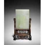 A rare pale green jade imperial-poem-inscribed double-sided panel Qianlong (2)