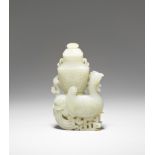 A very pale green jade archaistic 'heavenly bird' vase and cover Qianlong (2)