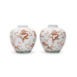 A pair of very rare iron-red and green-enamelled ovoid jars Yongzheng six-character marks and of ...