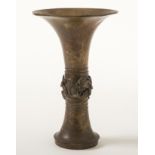 An archaistic gold-splashed bronze beaker vase, gu 17th/18th century