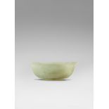 A yellow and russet jade bowl Mid Qing Dynasty