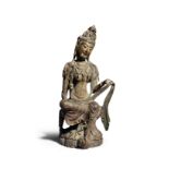 A carved wood figure of Guanyin Qing Dynasty