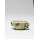 An archaistic 'Chicken-Bone' jade pouring vessel, Yi 17th/18th century