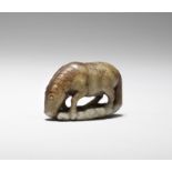 A pale green and russet jade carving of a horse Ming Dynasty