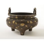 A fine gold-splashed bronze tripod incense burner, liding Xuande six-character mark, 18th/19th ce...