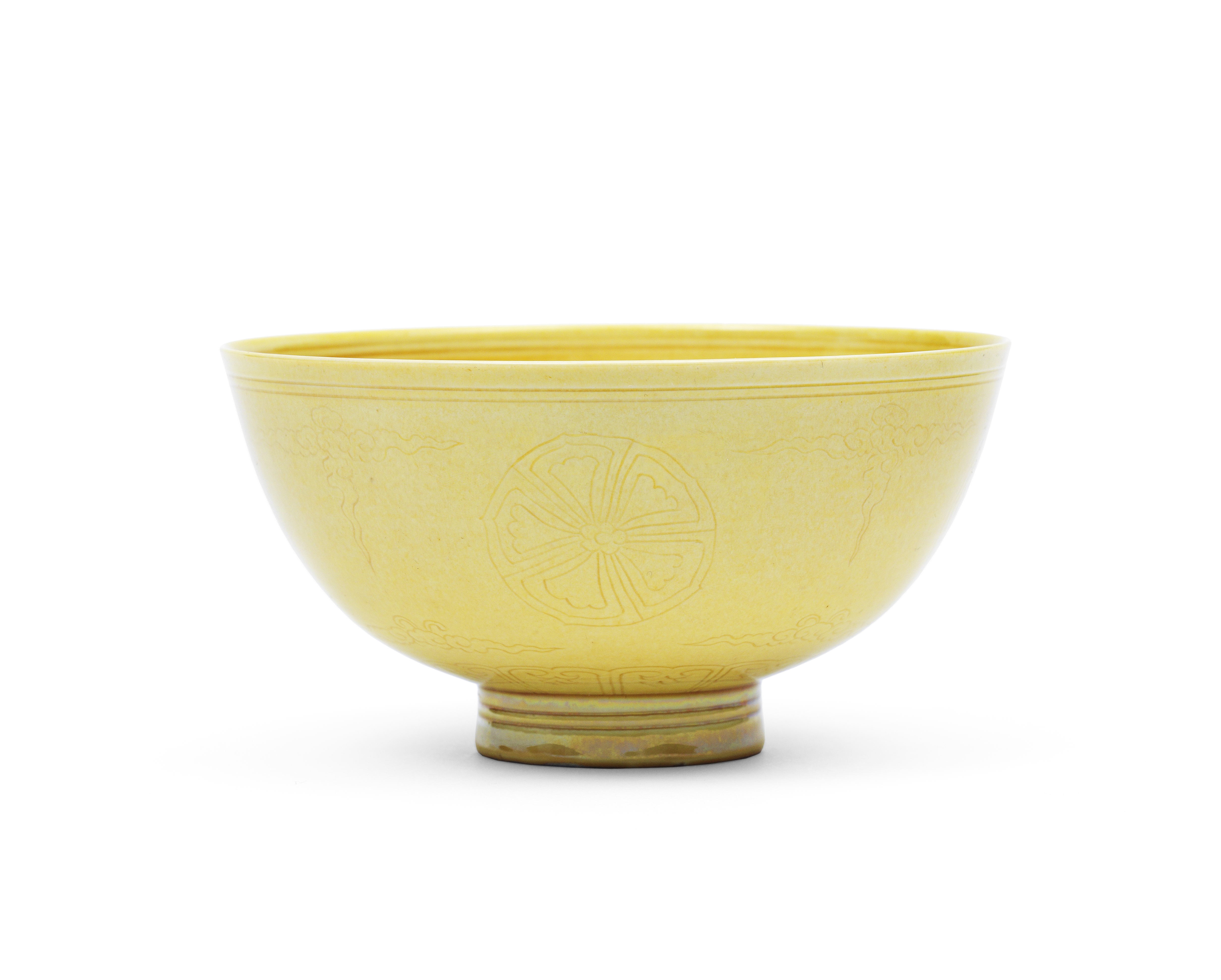 A rare yellow-glazed incised bowl Kangxi six-character mark and of the period