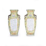 A pair of famille rose yellow-ground wall vases Shende Tang four-character marks, Republic Perio...