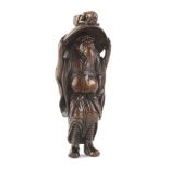 A wood netsuke of Shoki and oni (demon) Edo period (1615-1868), late 18th/early 19th century