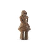 A Wood netsuke of a haniwa warrior By Ouchi Sosui (1911-1972), Showa era (1926-1989), 20th century