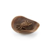 A boxwood netsuke of a crab in a chestnut By Miyazaki Joso (1835-1910) of Tokyo, Meiji era (1868...