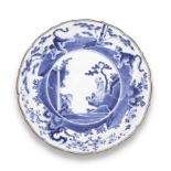 A blue-and-white kakiemon-style large flori-rimmed dish Edo period (1615-1868), circa 1700 (2)