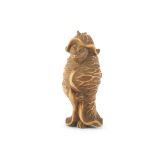 A pale boxwood netsuke of a badger Edo period (1615-1868) or Meiji era (1868-1912), mid-late 19t...