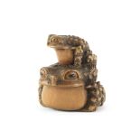 A wood netsuke of two toads By Masanao, Yamada, Ise Province, Edo period (1615-1868), 19th century