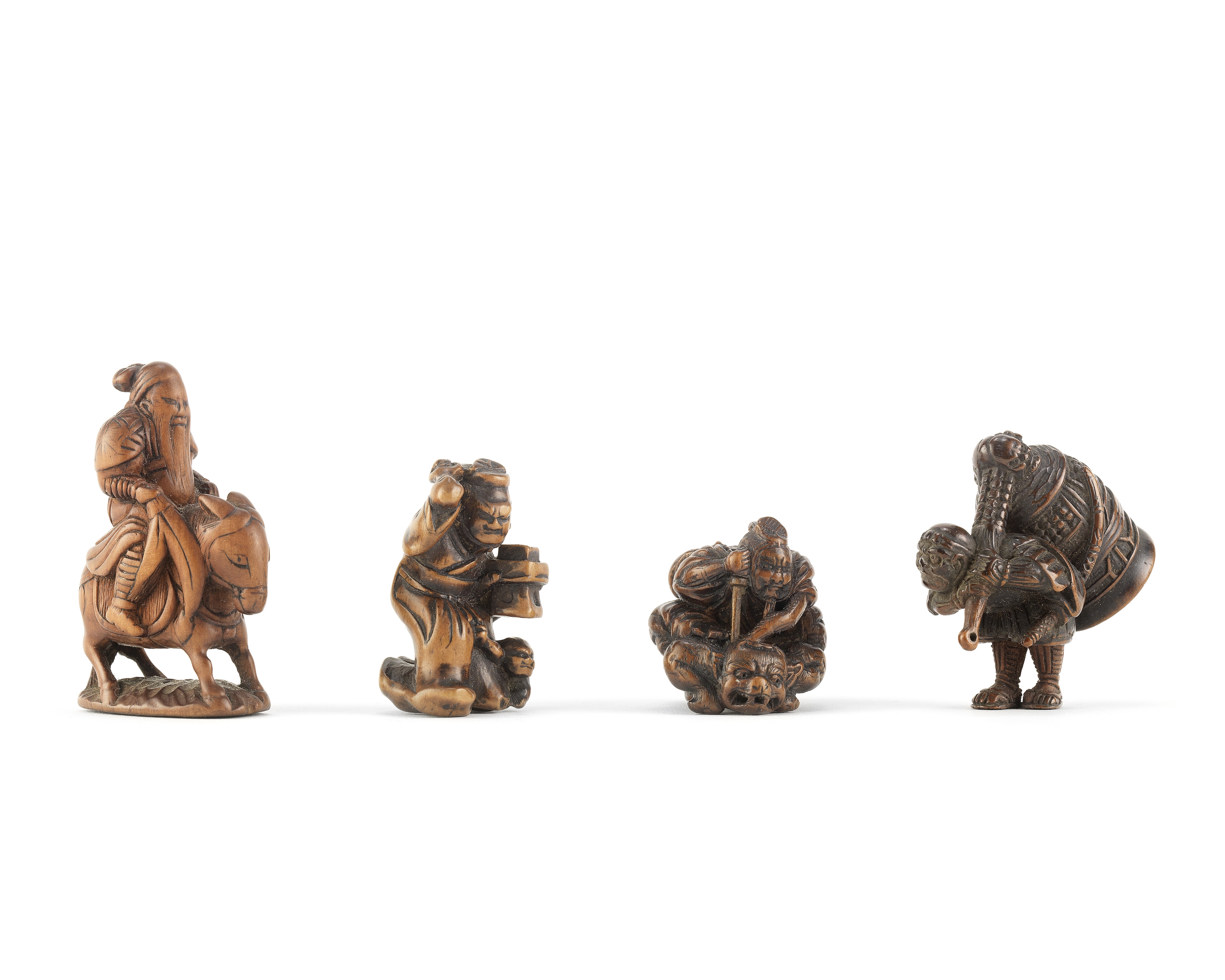 Four wood various figure netsuke Edo period (1615-1868), late 18th/early 19th century (4)