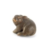 A wood netsuke of a rabbit By Ichibun, Edo period (1615-1868) or Meiji era (1868-1912), 19th cen...