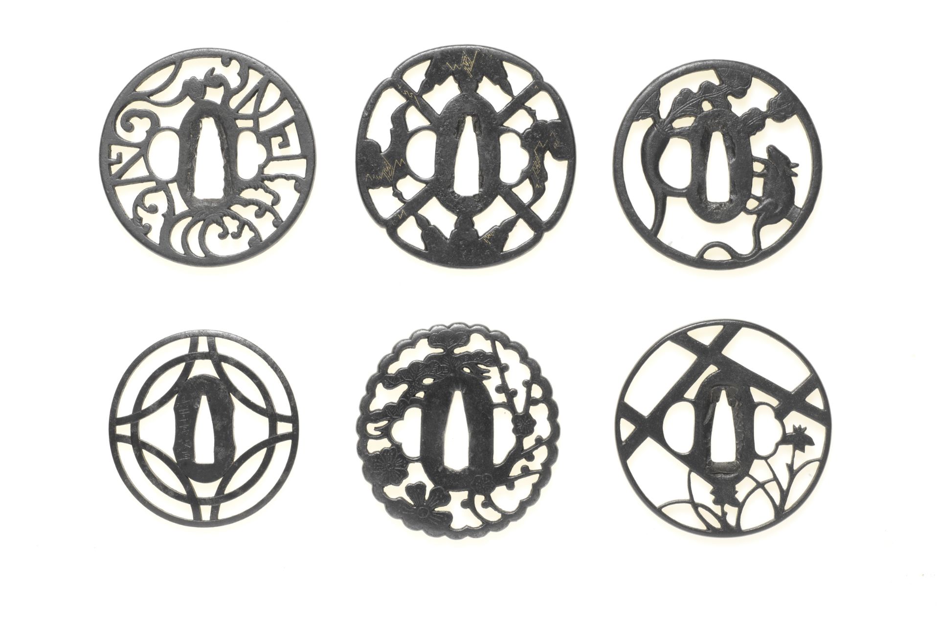 Nine iron sukashi (openwork) tsuba (sword guards) Momoyama (1573-1615) and Edo (1615-1868) period...