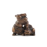 A wood netsuke of Hadesu slaying a tiger By Tsuguhisa, Edo period (1615-1868), 19th century