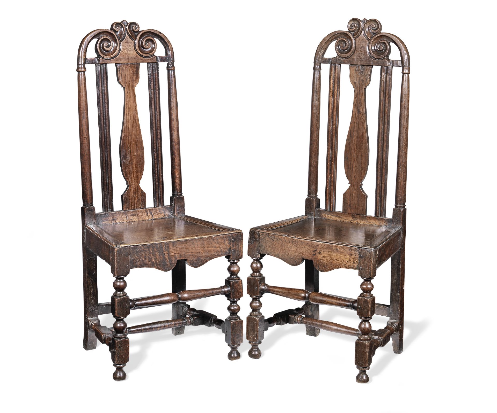 A pair of late 17th century oak chairs (2)