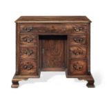 A George II mahogany kneehole desk