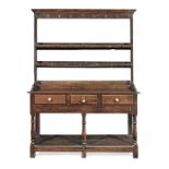 A small 18th century and later oak high backed dresser.