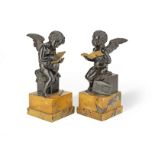 A pair of French 19th century bronze and ormolu figures of putti (2)