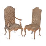 A set of eight French second quarter 20th century limed oak dining chairs In the manner of Maiso...