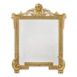 A late 19th/ early 20th century gilt brass wall mirror