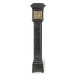 A rare 17th century weight driven wall clock now contained in an ebonised floorstanding case Unsi...