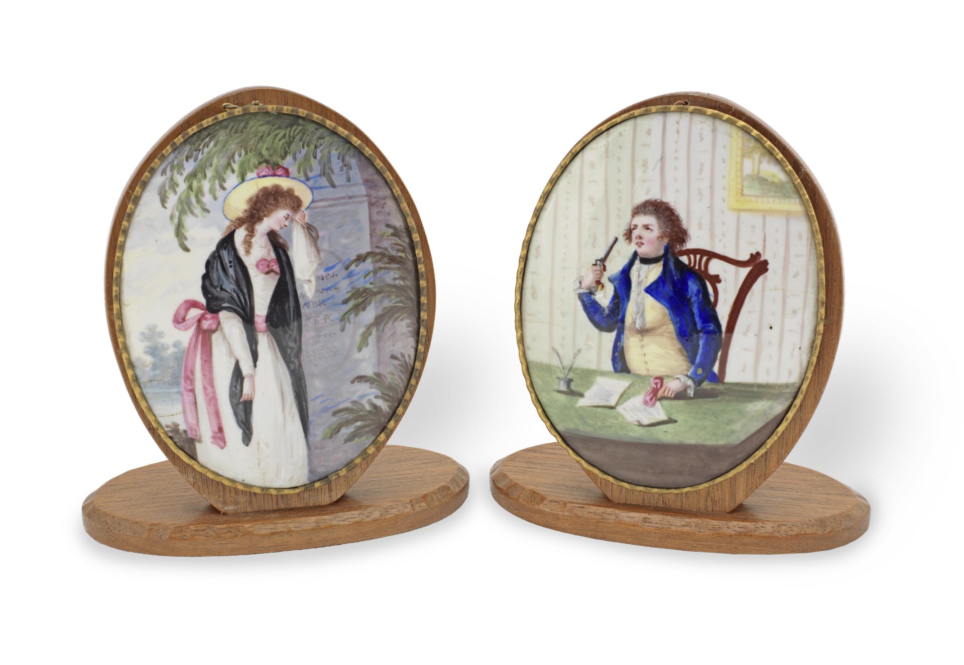 A pair of late 18th century oval enamel plaques