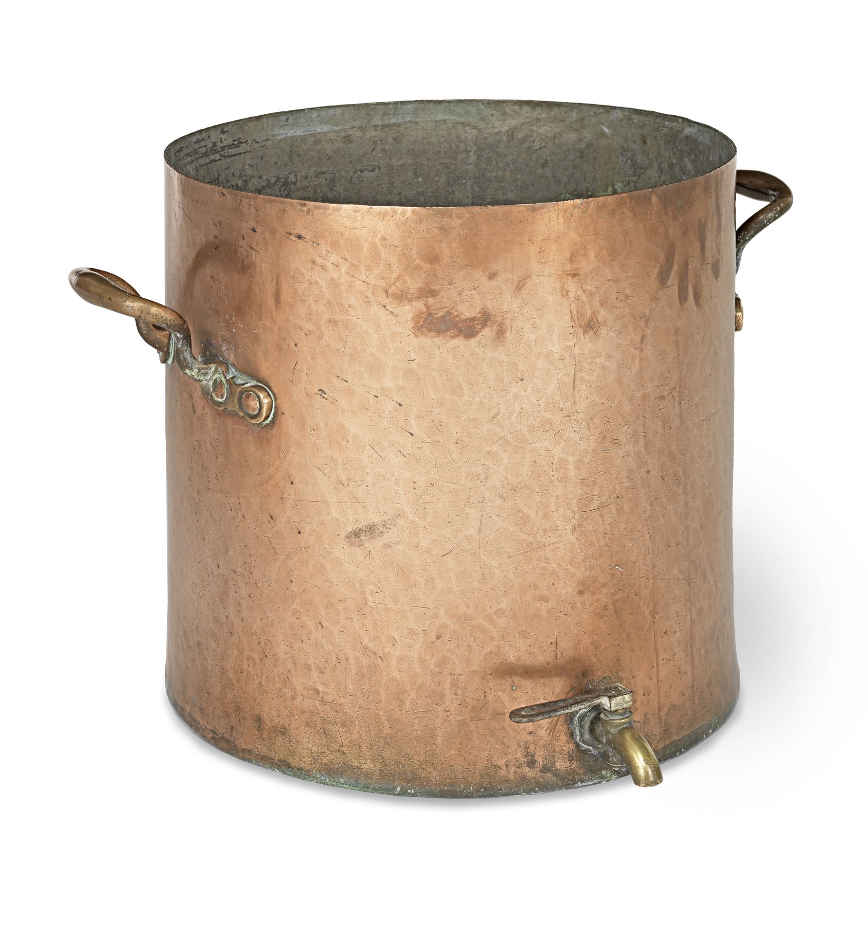 A large copper cylindrical cauldron