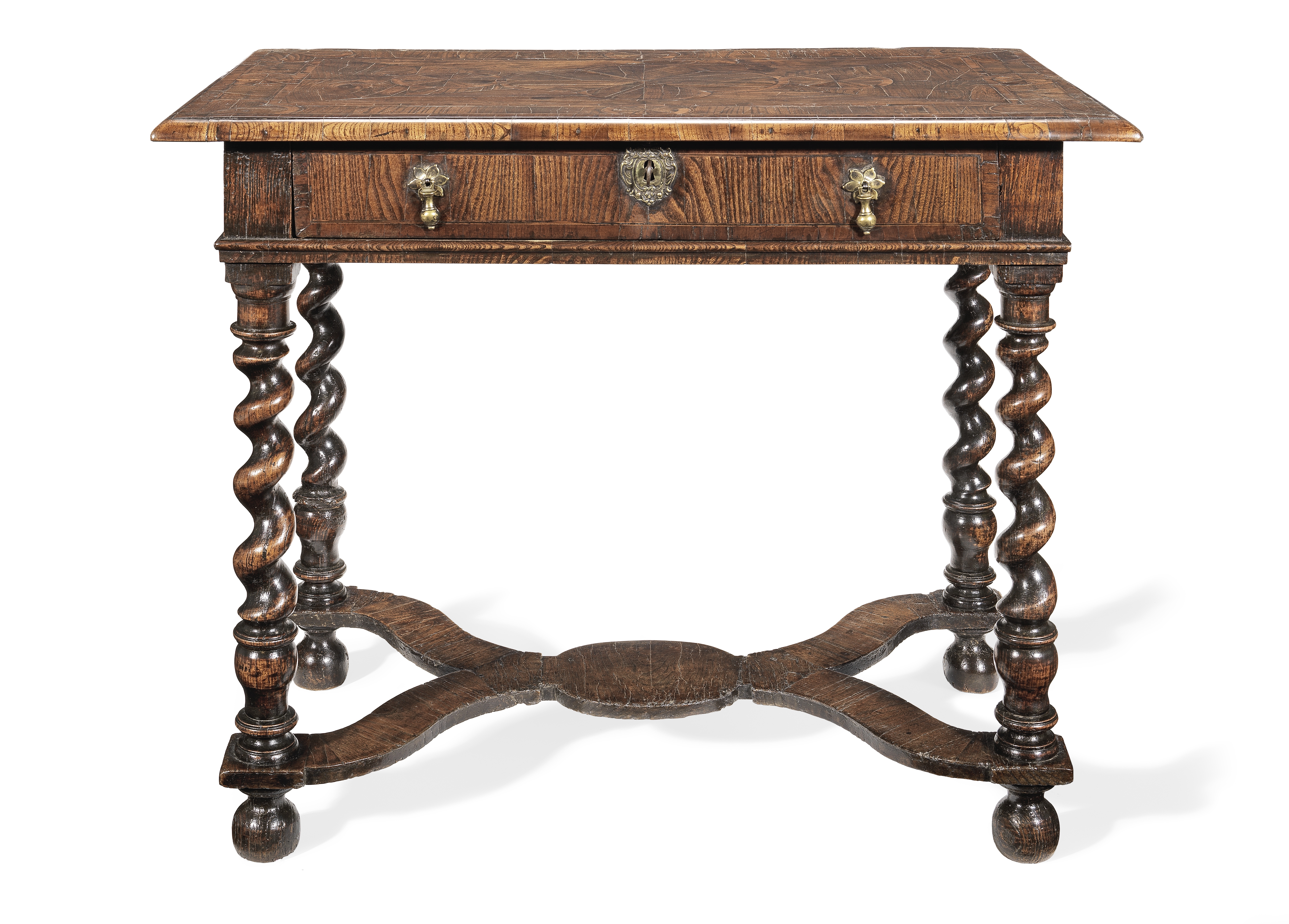 An early 18th century elm and walnut side table