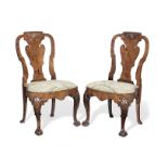A pair of George I and later walnut chairs