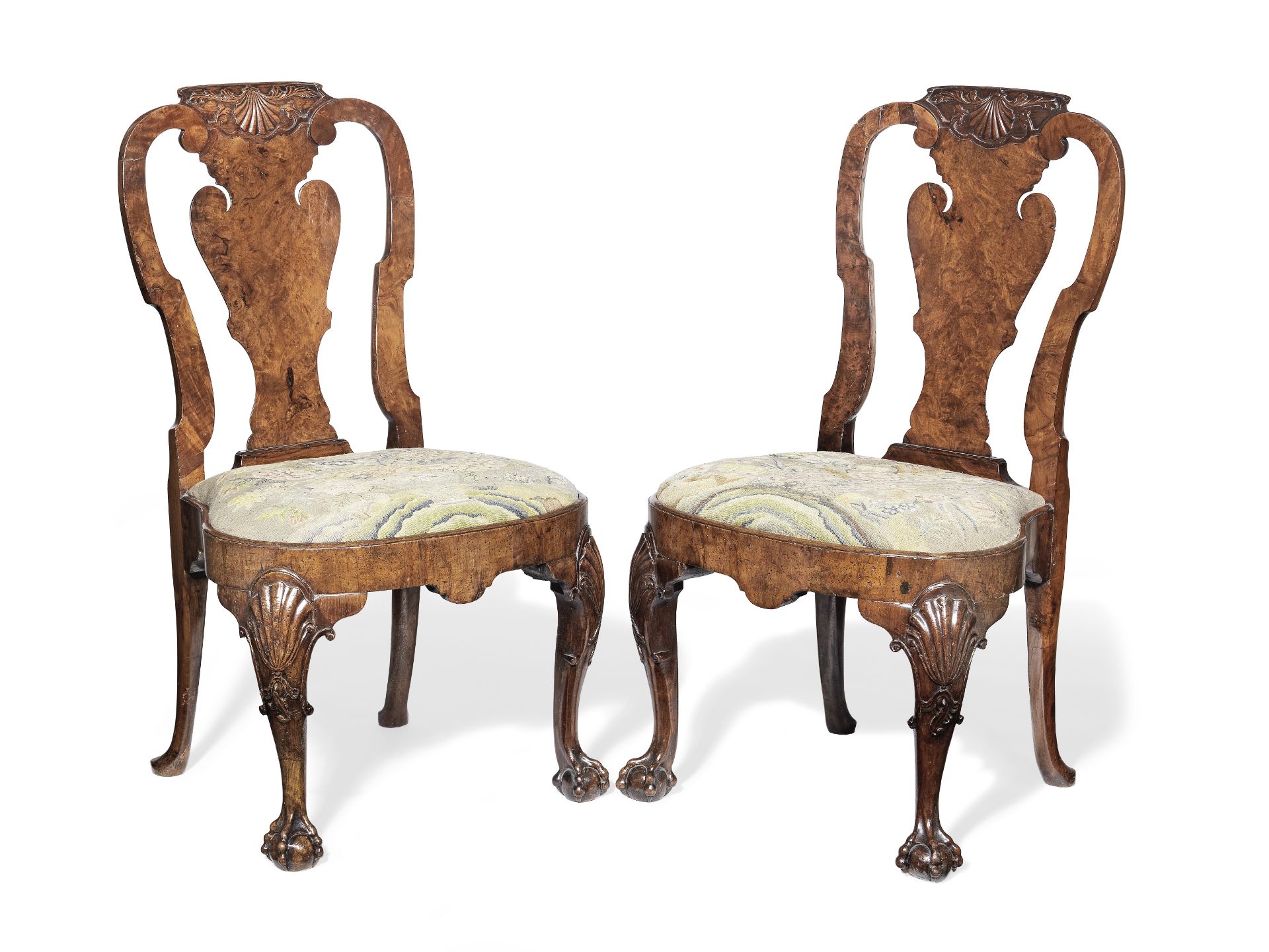 A pair of George I and later walnut chairs