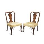 A pair of George II walnut side chairs In the manner of Giles Grendey (2)