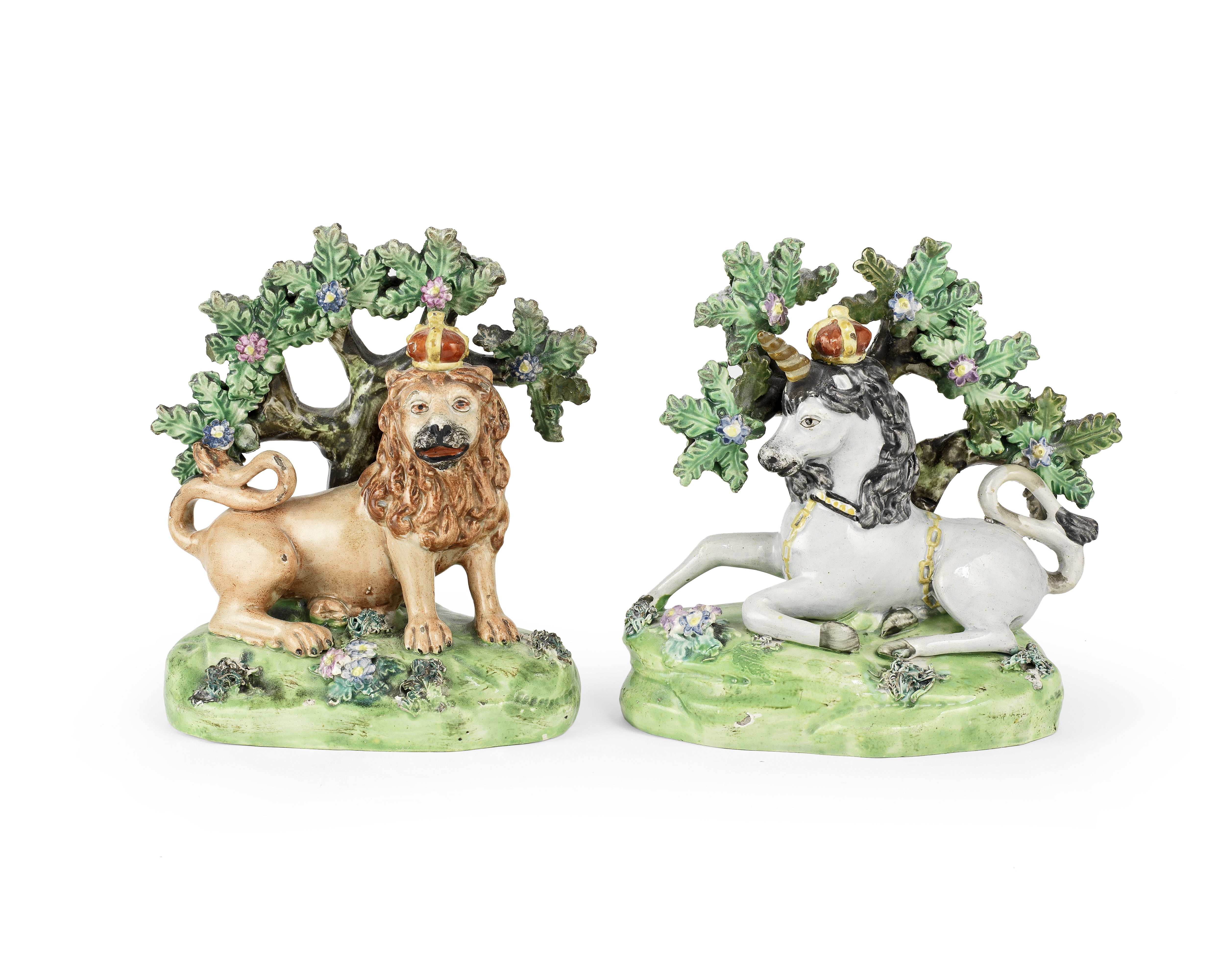 A pair of Staffordshire models of the Royal Arms supporters by John Walton, circa 1820-30
