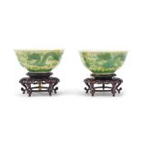 A pair of Chinese Green and yellow glazed 'two-dragon' bowls Guangxu six-character marks and of t...