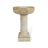 A marble jardiniere on stand