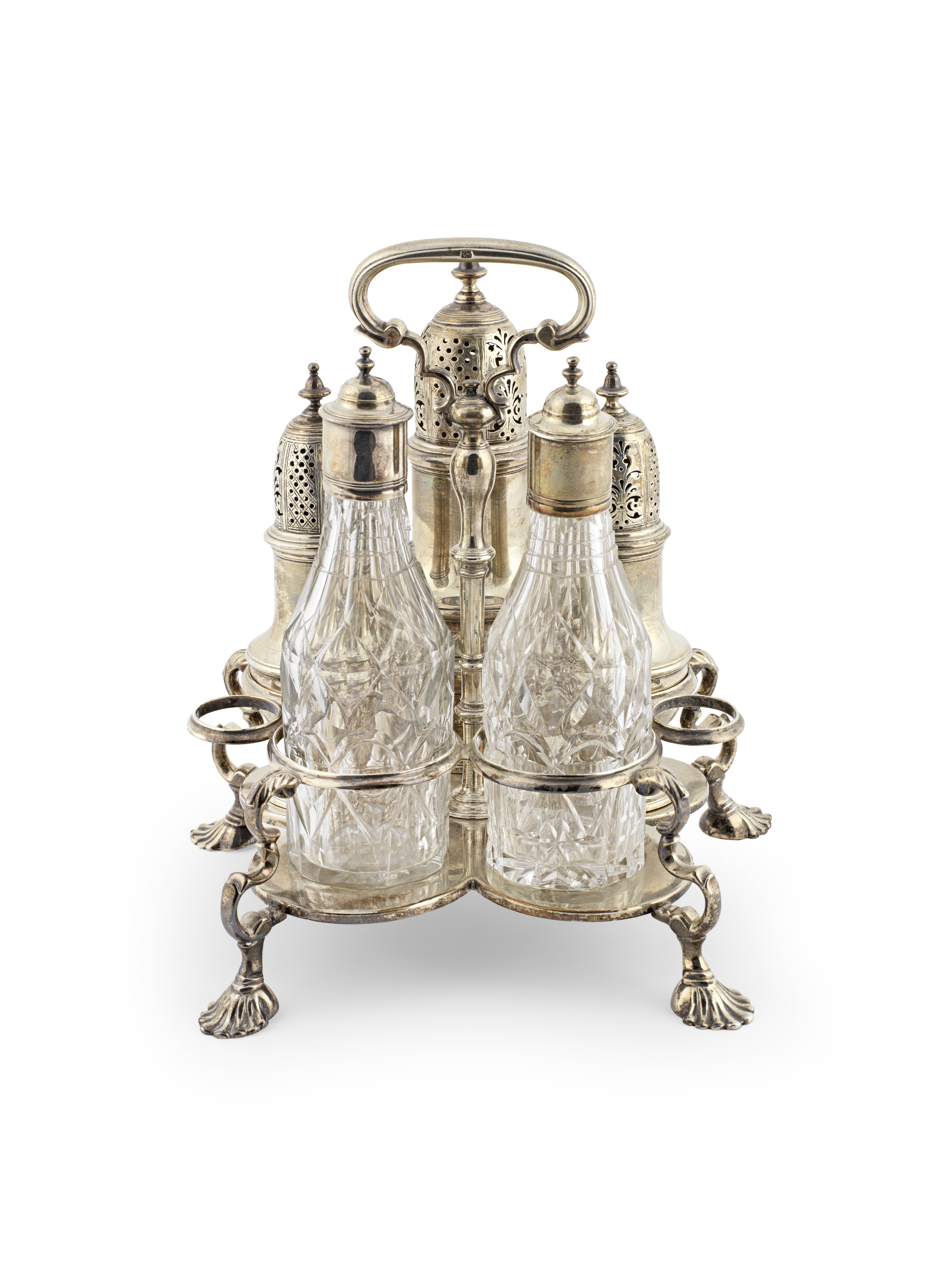 A George II silver Warwick cruet Samuel Wood, London 1740, three of the casters, London 1742 and ...