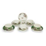 Three Worcester fluted tea bowls and saucers, a fluted cup and saucer and two apple-green ground ...