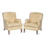 A pair of late 19th century armchairs Made by Howard & Sons (2)