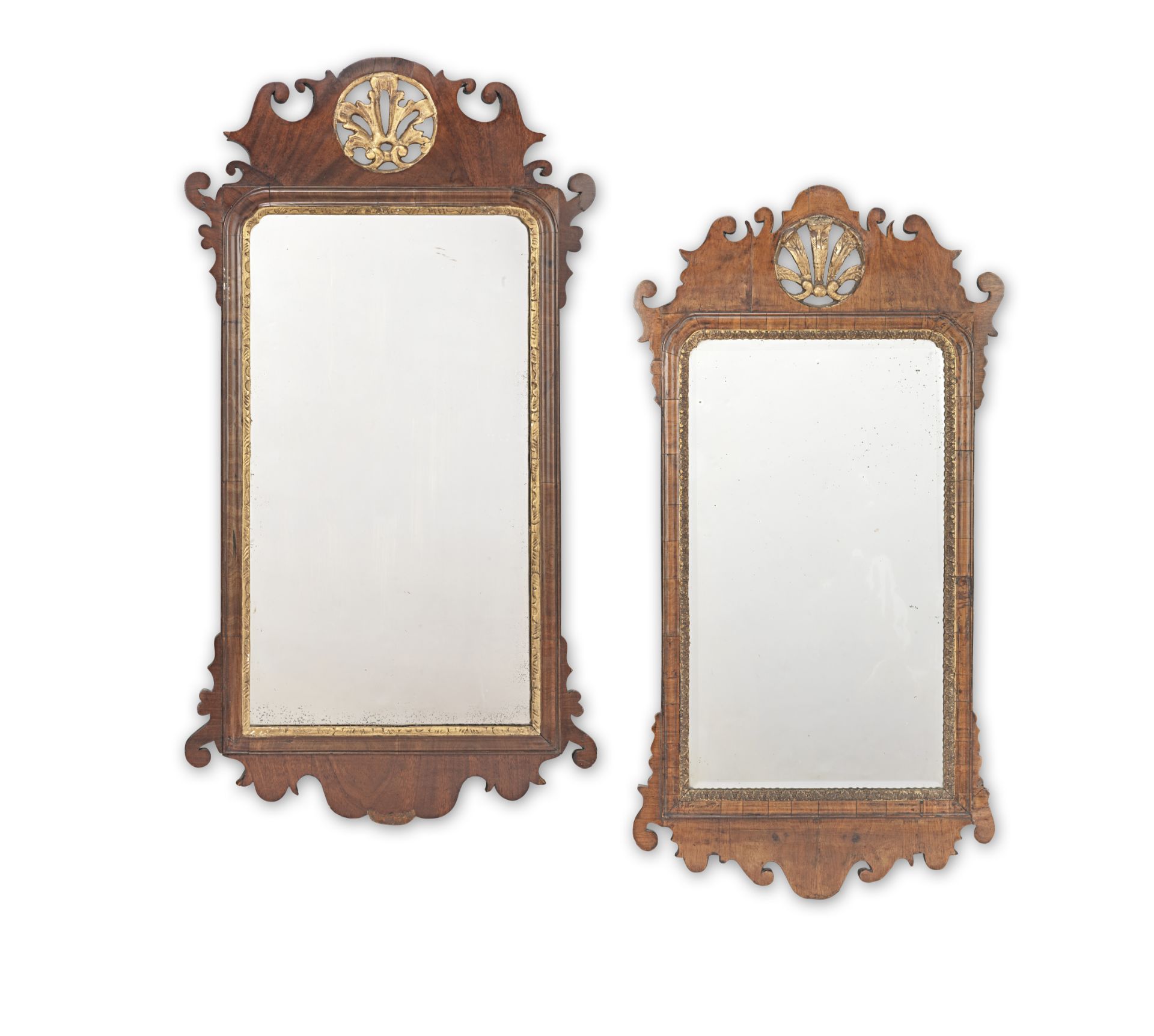 A Queen Anne walnut and parcel gilt mirror together with a similar George I mirror (2)