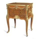 A French late 19th century ormolu mounted tulipwood, sycamore, stained and fruitwood parquetry ta...